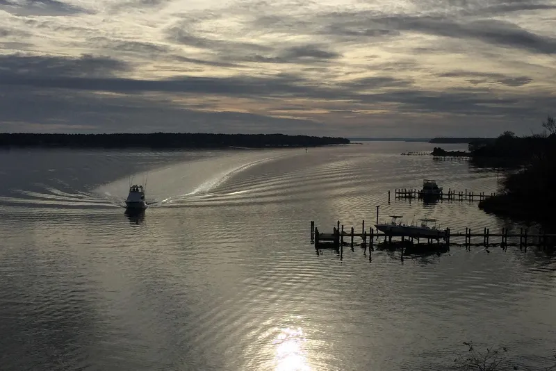 Slide: The Image of Cockpit view of 2001 Ocean Yachts 40 Super Sport, featuring controls and seating. - 9