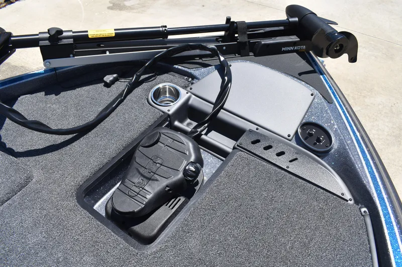 Slide: The Image of 2026 Triton 179 TrX boat deck with Minn Kota trolling motor and foot pedal. - 13
