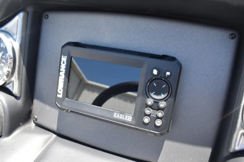 Slide: The Image of Dashboard of 2026 Triton 179 TrX with Lowrance Eagle 5 fishfinder. - 29