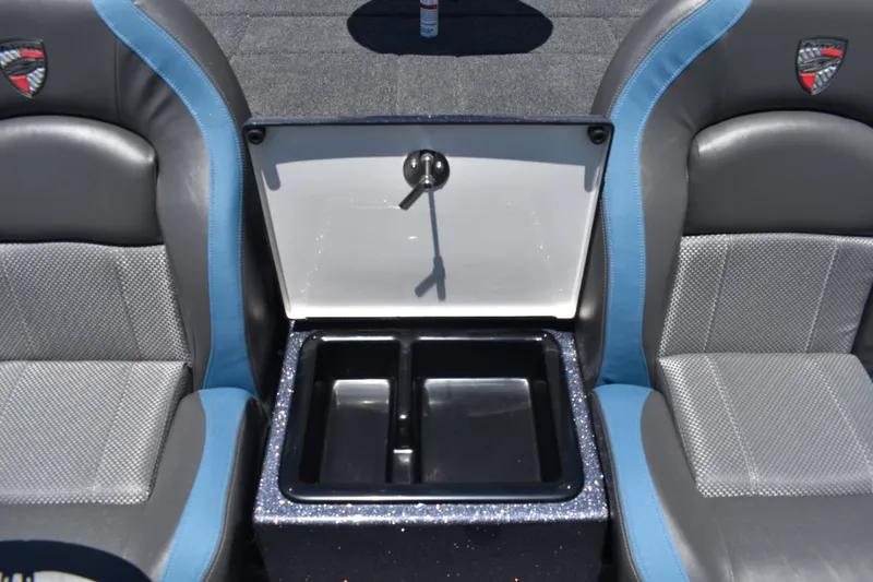 Slide: The Image of Interior of 2026 Triton 179 TrX boat showing seating and storage compartment. - 34