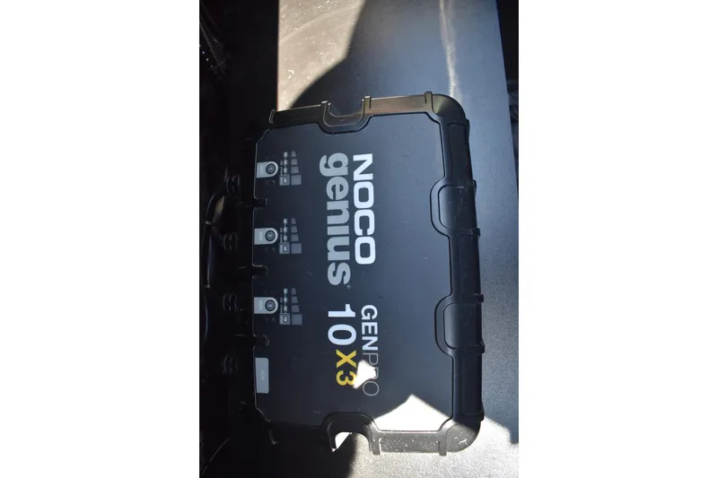 Slide: The Image of NOCO Genius GENPRO 10X3 charger in 2026 Triton 179 TrX boat. - 46