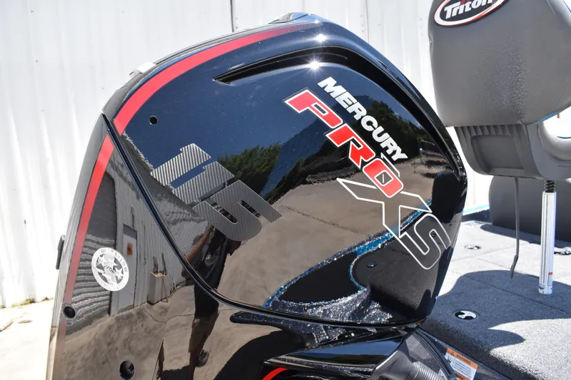 Slide: The Image of 2026 Triton 179 TrX boat with Mercury Pro XS 115 engine, close-up view. - 5