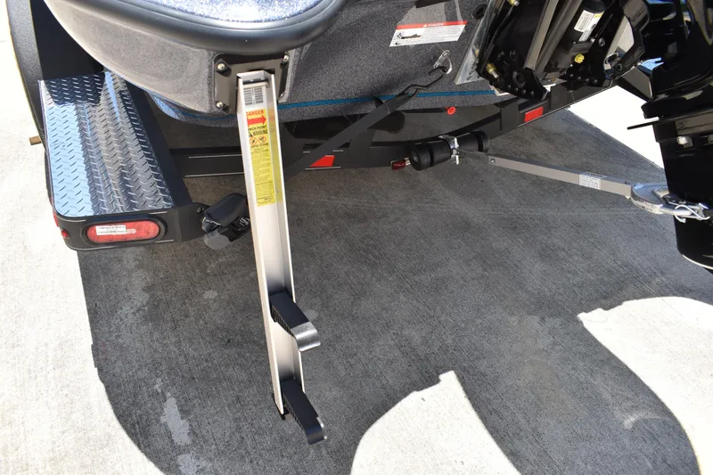 Slide: The Image of Rear view of 2026 Triton 179 TrX boat trailer with step and hitch. - 8