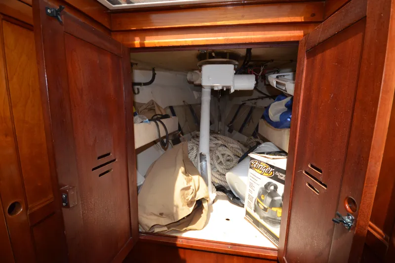 Slide: The Image of Interior storage space of 1992 Hinckley Sou'wester 59 sailboat with ropes and equipment. - 41