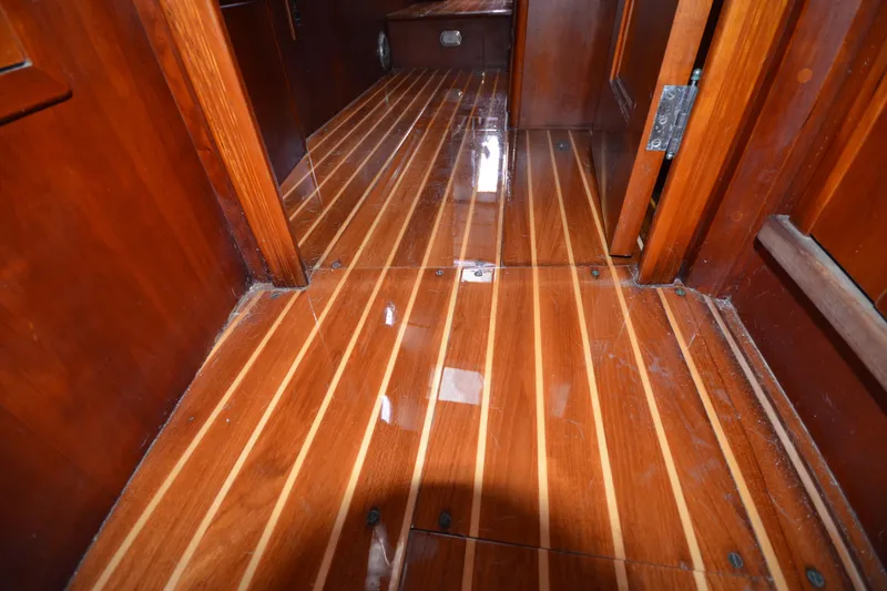 Slide: The Image of Polished wooden interior flooring of 1992 Hinckley Sou'wester 59 yacht. - 45