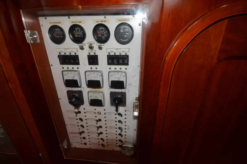 Slide: The Image of Control panel of a 1992 Hinckley Sou'wester 59 yacht with gauges and switches. - 53