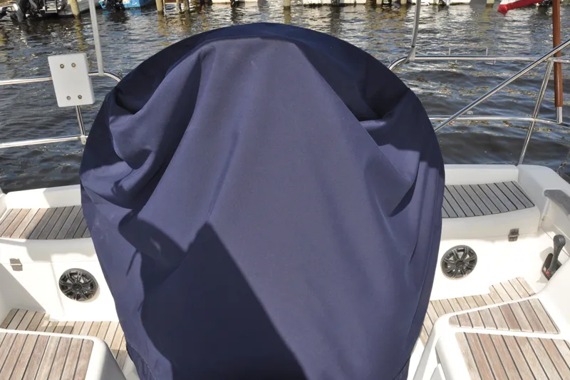 Slide: The Image of Covered helm of 2010 Jeanneau Sun Odyssey 36i sailboat at dock. - 13