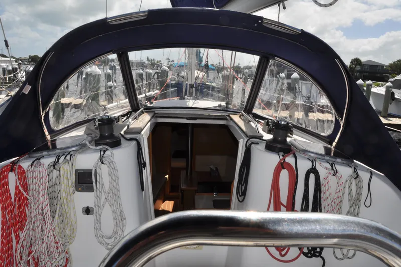 Slide: The Image of Cockpit view of 2010 Jeanneau Sun Odyssey 36i sailboat with ropes and winches. - 18