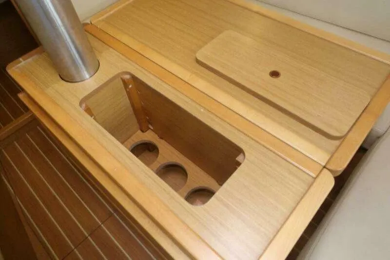 Slide: The Image of Interior table with storage on 2010 Jeanneau Sun Odyssey 36i yacht. - 29