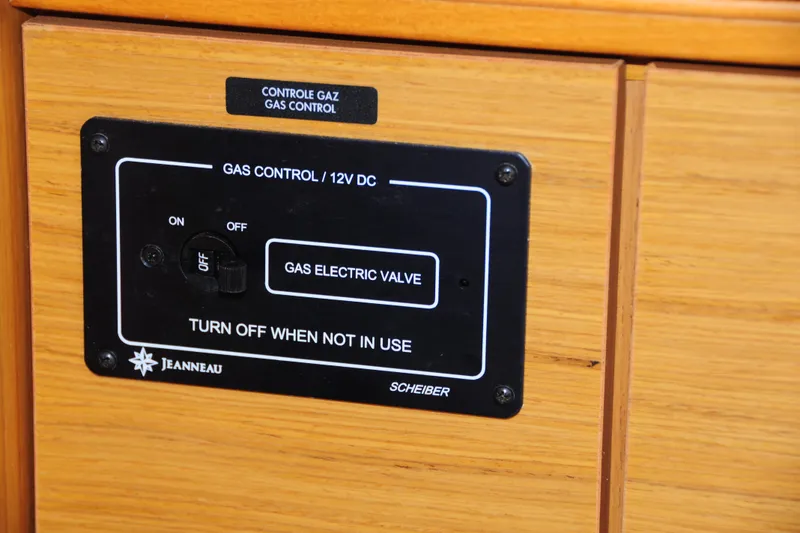 Slide: The Image of Gas control panel on 2010 Jeanneau Sun Odyssey 36i yacht, featuring electric valve switch. - 37