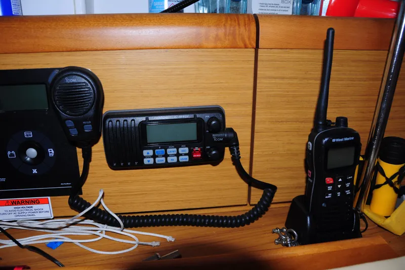 Slide: The Image of Boat communication equipment on Jeanneau Sun Odyssey 36i, 2010 model, featuring Icom and West Marine devices. - 42