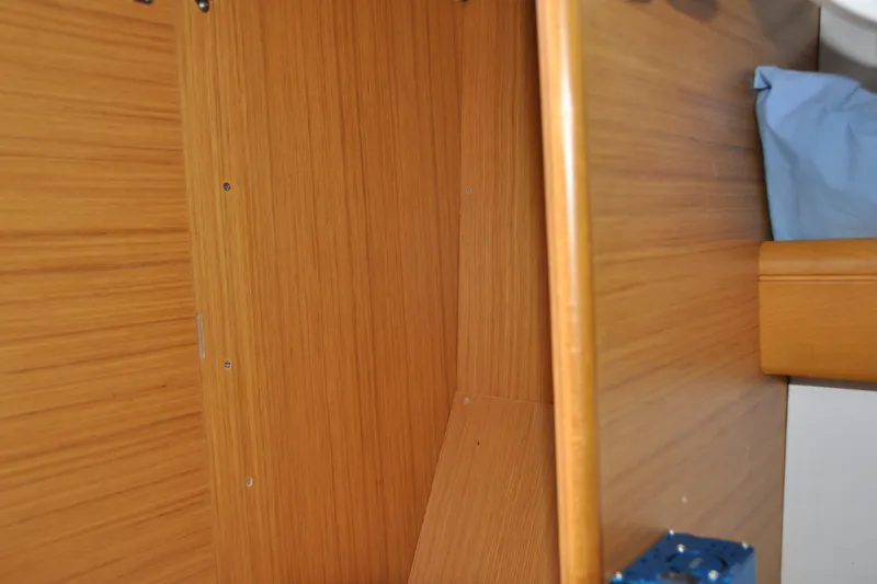 Slide: The Image of Interior wooden paneling of 2010 Jeanneau Sun Odyssey 36i sailboat cabin. - 62