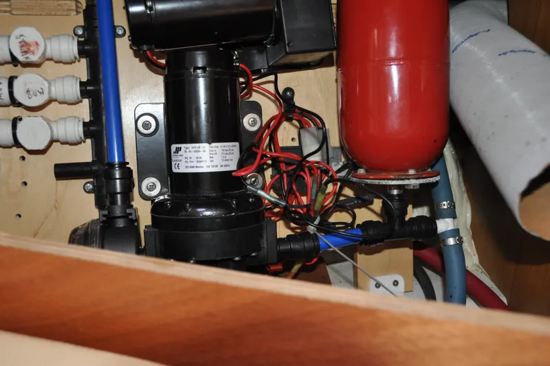 Slide: The Image of Electrical and plumbing system inside a 2010 Jeanneau Sun Odyssey 36i yacht. - 68