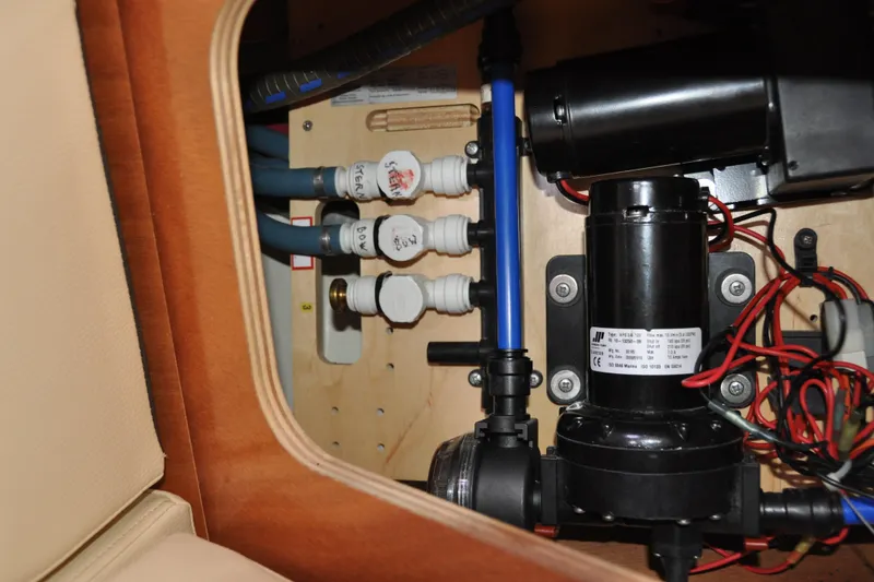 Slide: The Image of Electrical and plumbing system inside a 2010 Jeanneau Sun Odyssey 36i yacht. - 69