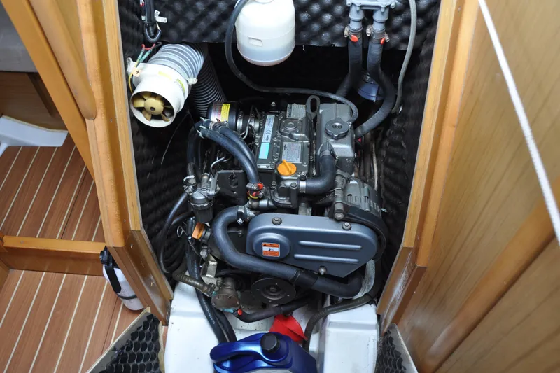 Slide: The Image of Engine compartment of 2010 Jeanneau Sun Odyssey 36i sailboat, showcasing detailed mechanics. - 71