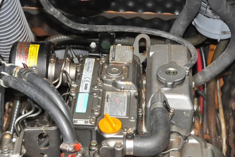 Slide: The Image of Engine compartment of a 2010 Jeanneau Sun Odyssey 36i sailboat, featuring detailed components. - 72