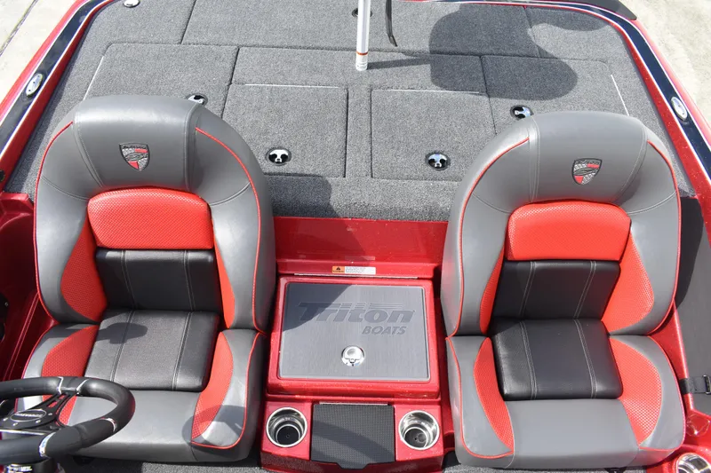 Slide: The Image of 2026 Triton 18 TrX boat deck with Minn Kota trolling motor. - 20