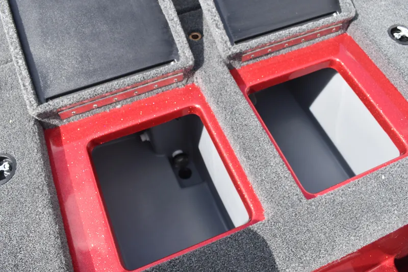 Slide: The Image of Rear view of a 2026 Triton 18 TrX boat with a foldable boarding ladder. - 21