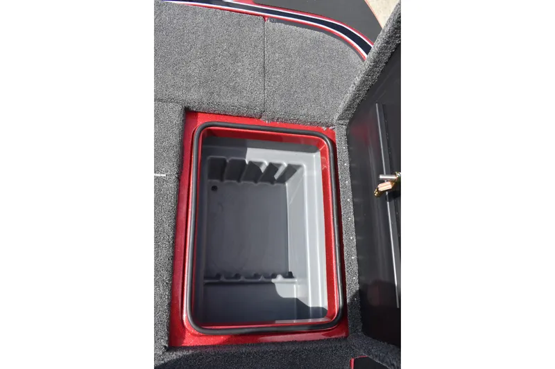 Slide: The Image of Red 2026 Triton 18 TrX boat with sleek design and metallic finish. - 26