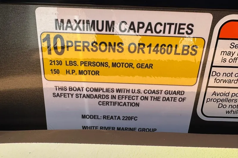 Slide: The Image of 2026 Ranger Reata 220FC capacity label: 10 persons or 1460 lbs, 150 HP motor. - 25