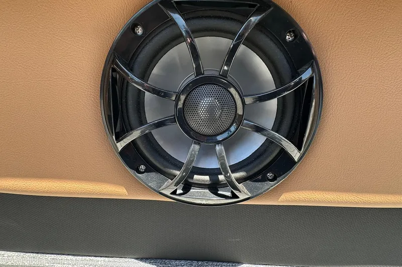 Slide: The Image of Close-up of a speaker in a 2026 Ranger Reata 220FC boat interior. - 40