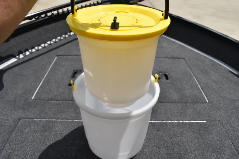 Slide: The Image of Fishing bucket with yellow lid on Lowe Fishing Machine 1625WT boat, 2026 model. - 17