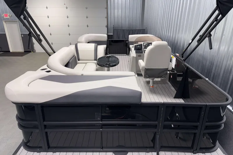 Slide: The Image of 2026 Sylvan Mirage 8520 Cruise pontoon boat with sleek interior design. - 2