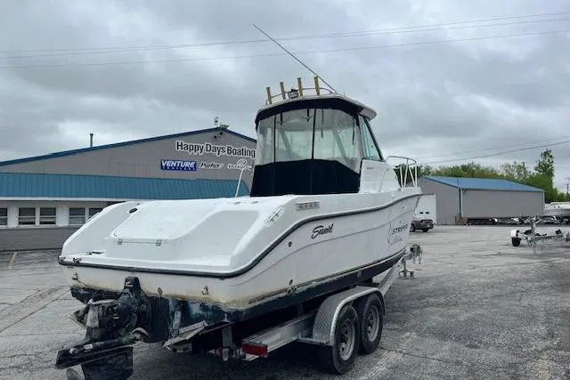 Slide: The Image of 2004 Seaswirl Striper 2601 Walkaround I/O boat on trailer at Happy Days Boating. - 10