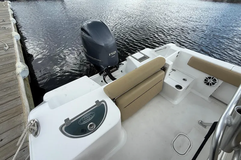 Slide: The Image of 2018 Sportsman Open 212 Center Console boat with Yamaha 150 engine at dock. - 15