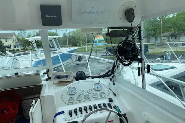 Slide: The Image of 2007 Baha Cruisers 251 GLE boat cockpit with navigation instruments and controls. - 4