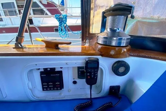 Slide: The Image of Cockpit of 1982 Endeavour 40 sailboat with radio and winch. - 22