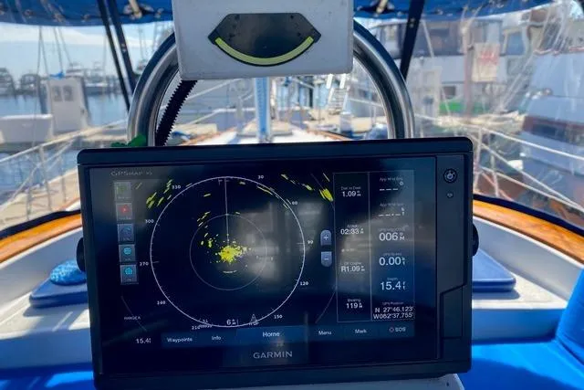 Slide: The Image of Cockpit view of 1982 Endeavour 40 sailboat with Garmin navigation display. - 25
