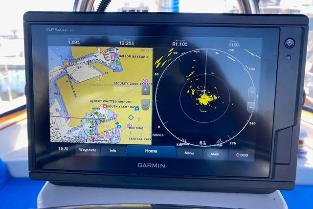 Slide: The Image of Garmin GPS display on 1982 Endeavour 40 sailboat, showing navigation and radar data. - 26