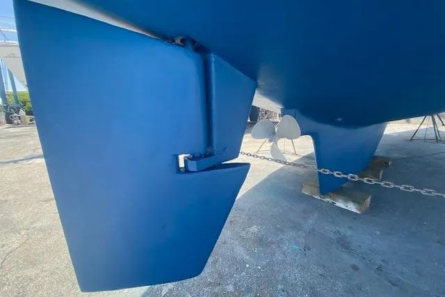 Slide: The Image of 1982 Endeavour 40 sailboat rudder and hull in dry dock. - 30