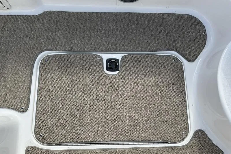 Slide: The Image of Carpeted deck of Hurricane FunDeck 196 RE boat, 2026 model. - 11