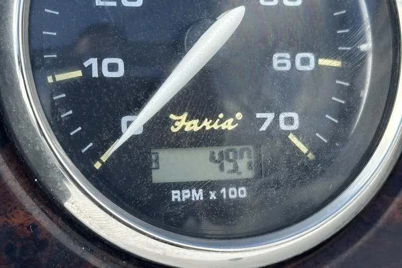 Slide: The Image of Close-up of a Faria tachometer showing 490 RPM on a 2026 Hurricane FunDeck 196 RE. - 16