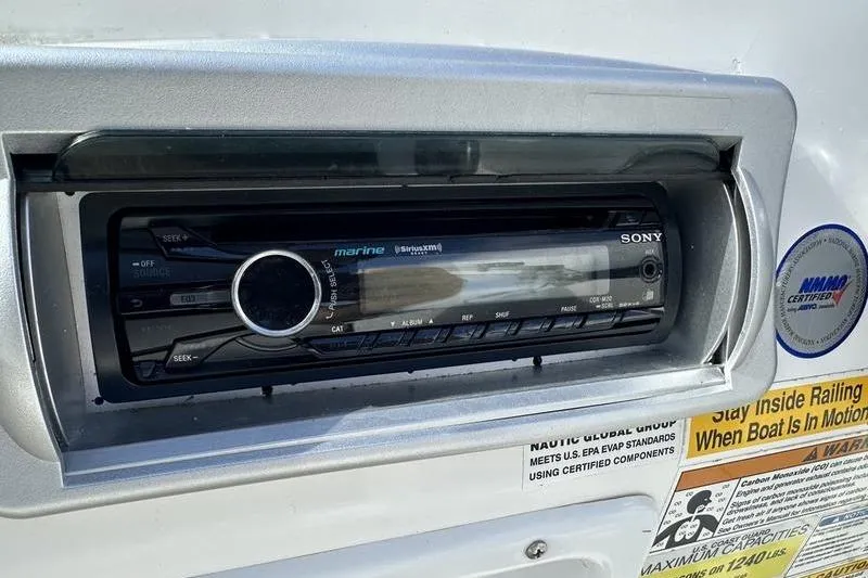 Slide: The Image of Sony marine stereo system on 2026 Hurricane FunDeck 196 RE boat dashboard. - 2