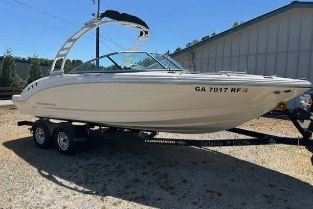 Slide: The Image of 2023 Chaparral 23 SSi boat on trailer, parked outdoors. - 19
