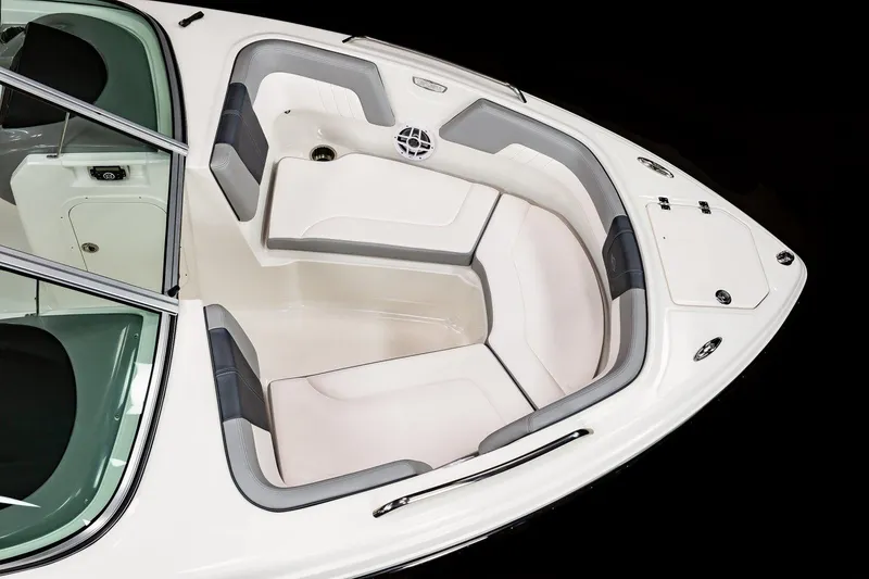 Slide: The Image of Manufacturer Provided Image: 2023 Chaparral 23 SSi boat interior with cushioned seating and storage compartments. - 2