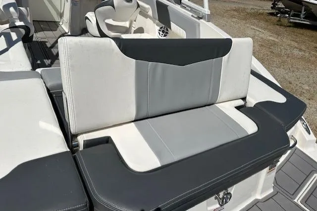 Slide: The Image of 2023 Chaparral 23 SSi boat interior with stylish seating and modern design. - 22