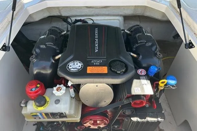 Slide: The Image of Engine compartment of 2023 Chaparral 23 SSi with Volvo Penta 250 V6 engine. - 29
