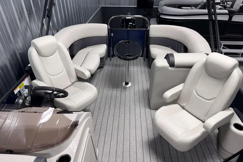 Slide: The Image of Luxurious interior of 2026 Sylvan Mirage 8520 LZ PTS Tritoon with plush seating and sleek design. - 12