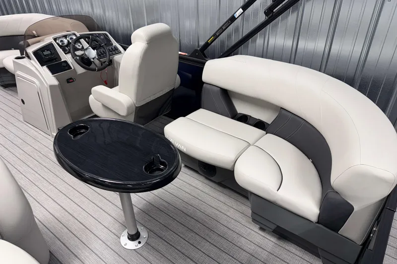 Slide: The Image of Luxurious interior of 2026 Sylvan Mirage 8520 LZ PTS Tritoon with plush seating and sleek table. - 3