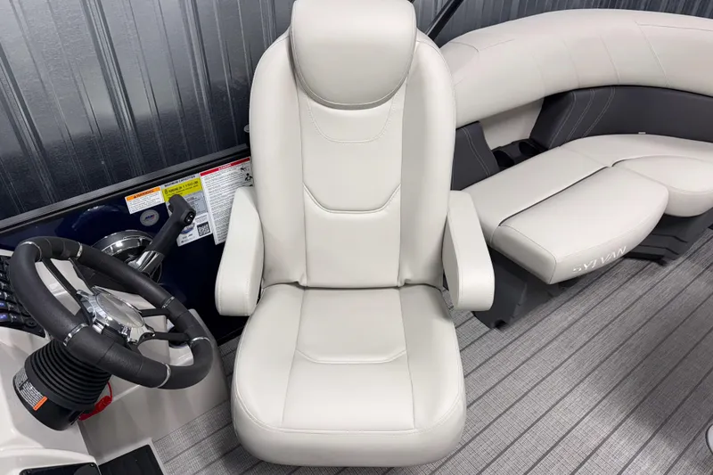 Slide: The Image of Captain's chair and steering wheel of 2026 Sylvan Mirage 8520 LZ PTS Tritoon boat. - 7