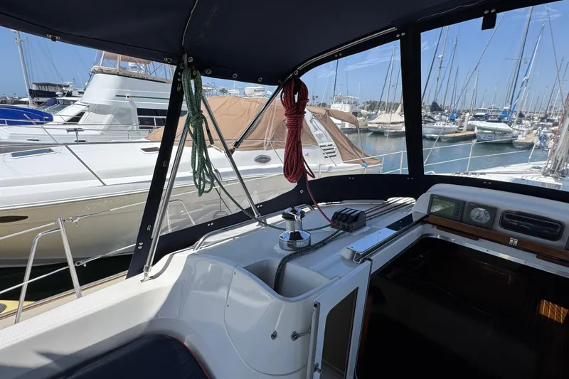 Slide: The Image of 2004 Hunter 41 Aft Cockpit sailboat interior with marina view. - 16