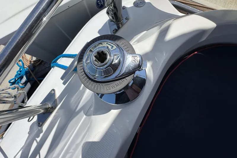 Slide: The Image of Winch on 2004 Hunter 41 Aft Cockpit sailboat, with ropes and stainless steel fittings. - 22