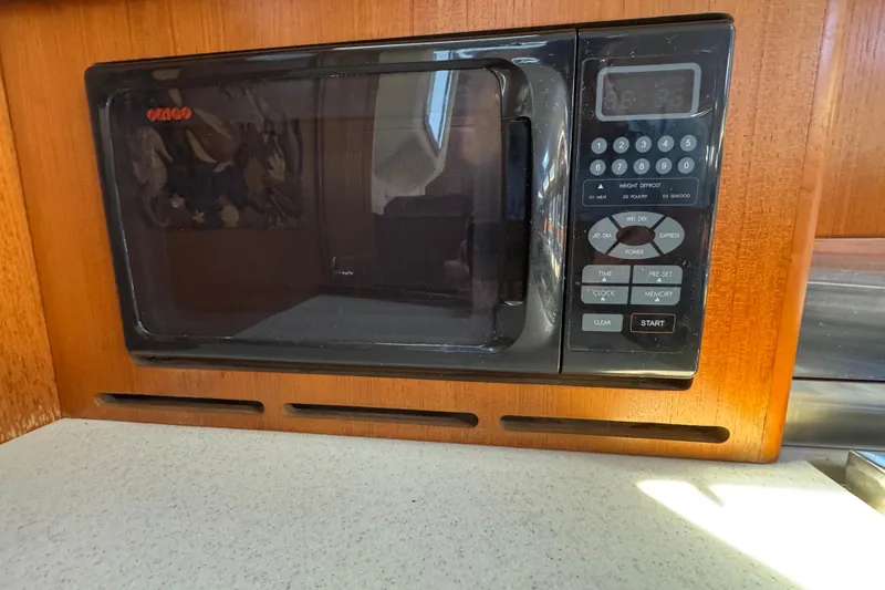 Slide: The Image of Built-in microwave in 2004 Hunter 41 Aft Cockpit yacht kitchen. - 32