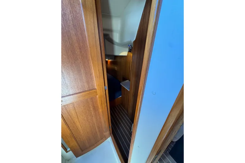Slide: The Image of Wooden interior of 2004 Hunter 41 Aft Cockpit sailboat cabin. - 64