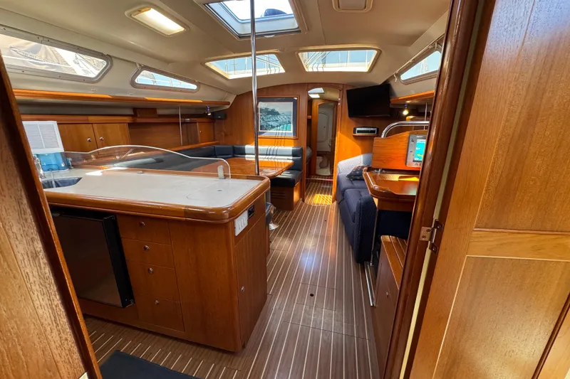 Slide: The Image of Interior of 2004 Hunter 41 Aft Cockpit yacht with wood finish and modern amenities. - 69