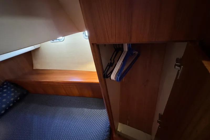 Slide: The Image of Interior of 2004 Hunter 41 Aft Cockpit yacht with bed and closet. - 72